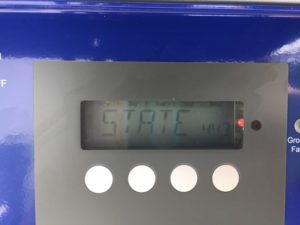 Picture of a Fronius IG inverter showing a red light and a State error code.